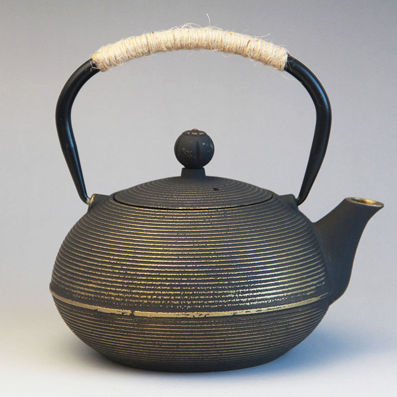 Cast iron kettle boiling water tea teapot