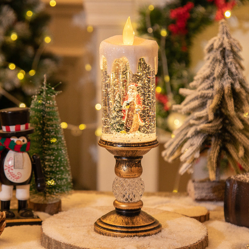 Weihnachtsdekoration im Schneekugel-Stil mit Kerzenlicht-Szene