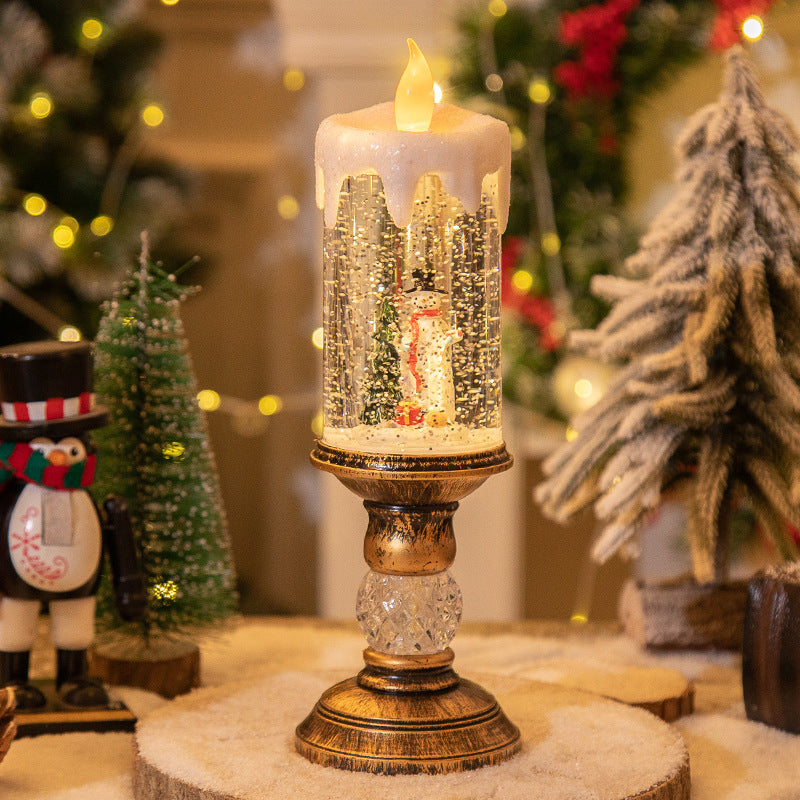 Weihnachtsdekoration im Schneekugel-Stil mit Kerzenlicht-Szene