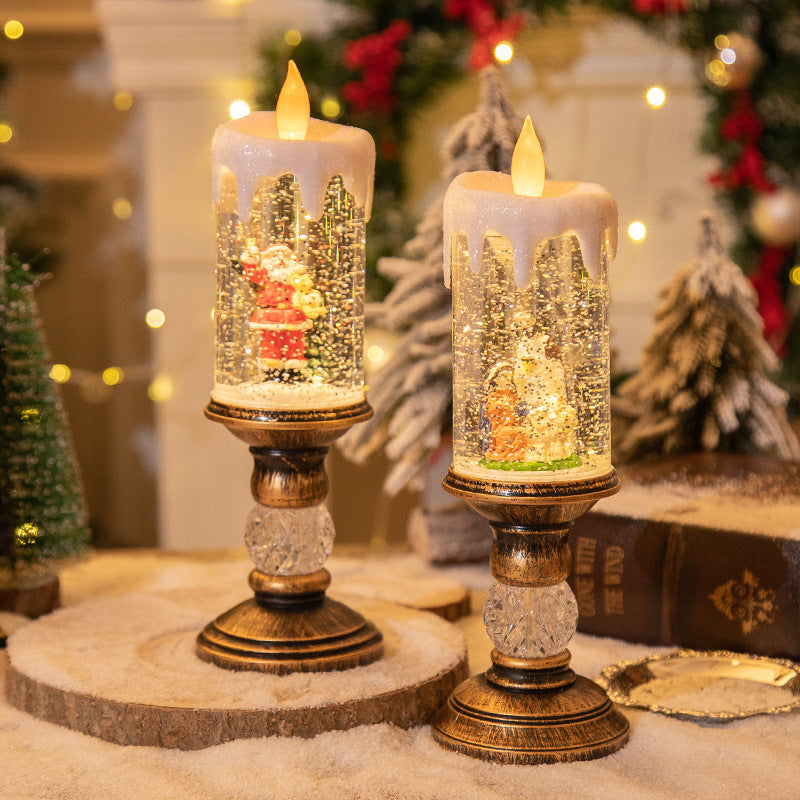 Weihnachtsdekoration im Schneekugel-Stil mit Kerzenlicht-Szene